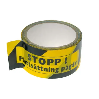 Tejp "Plattsättning Pågår"  33m/rulle